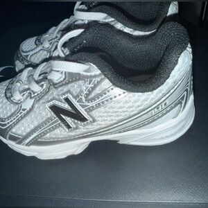 New Balance Silver and Black Athletic Shoes